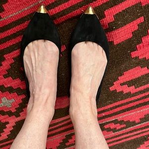 Elegant Brian Atwood black suede flats with gold tipped toes